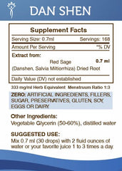 Pouring Secrets of the Tribe Danshen tincture into a glass