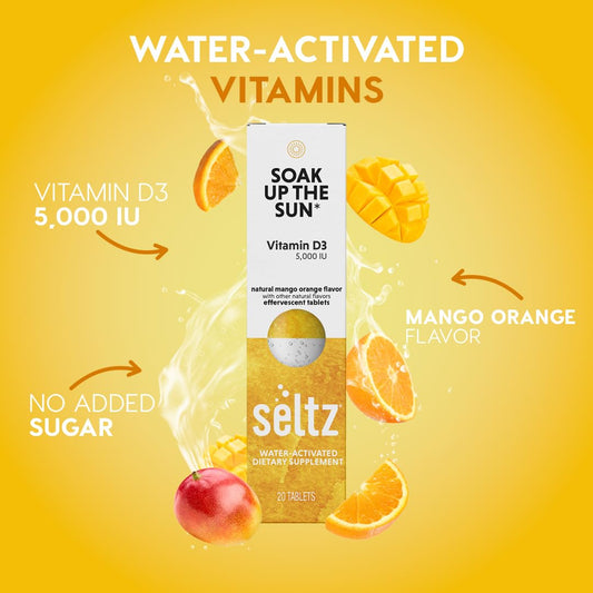 Seltz Soak Up The Sun fizzing water in a glass with mango orange flavor.
