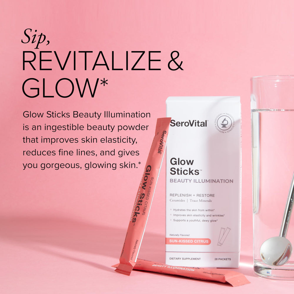 Glass with Glow Sticks dissolving in water illustrating sugar-free citrus refreshment