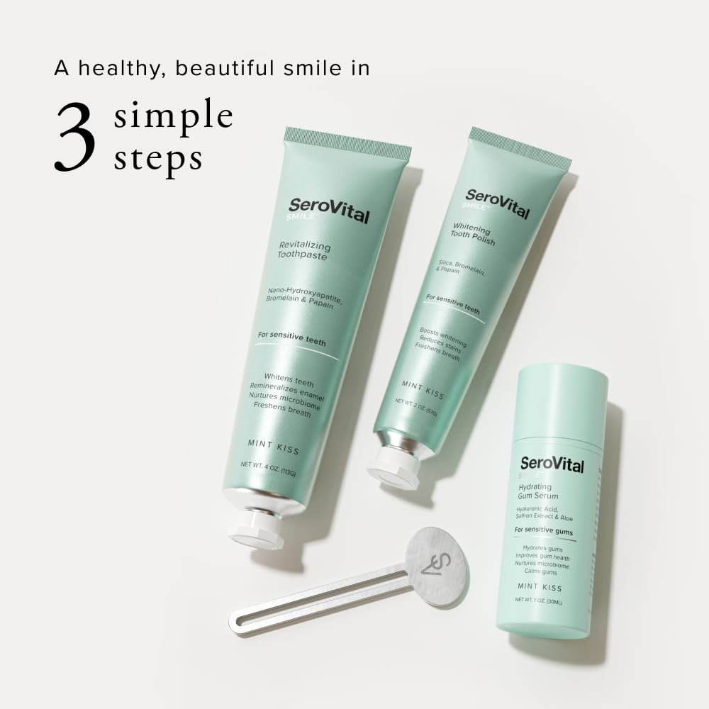 Hands applying Serovital Smile Serum as part of nightly oral care.