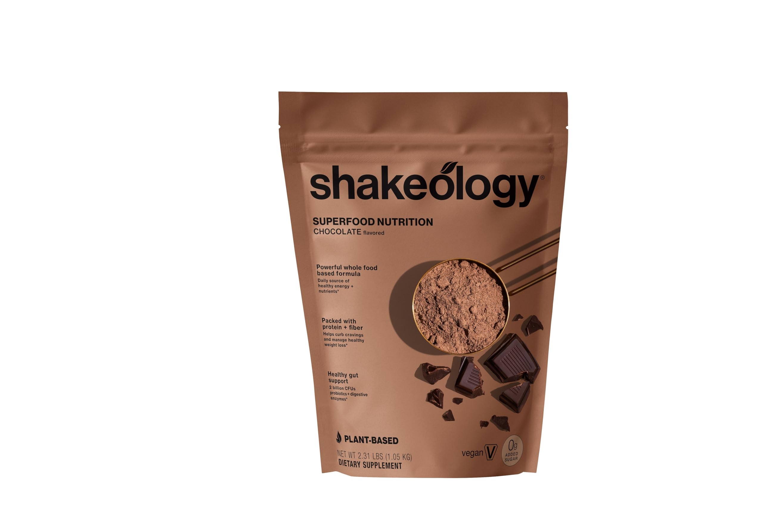 Shakeology 0g added sugar chocolate powder bag highlights plant-based protein for balanced nutrition.