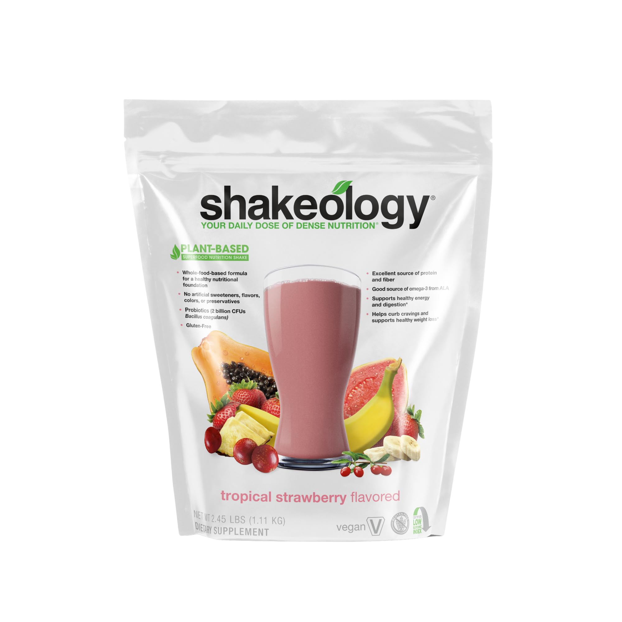 Shakeology Tropical Strawberry canister on shelf for daily plant-based nutrition.