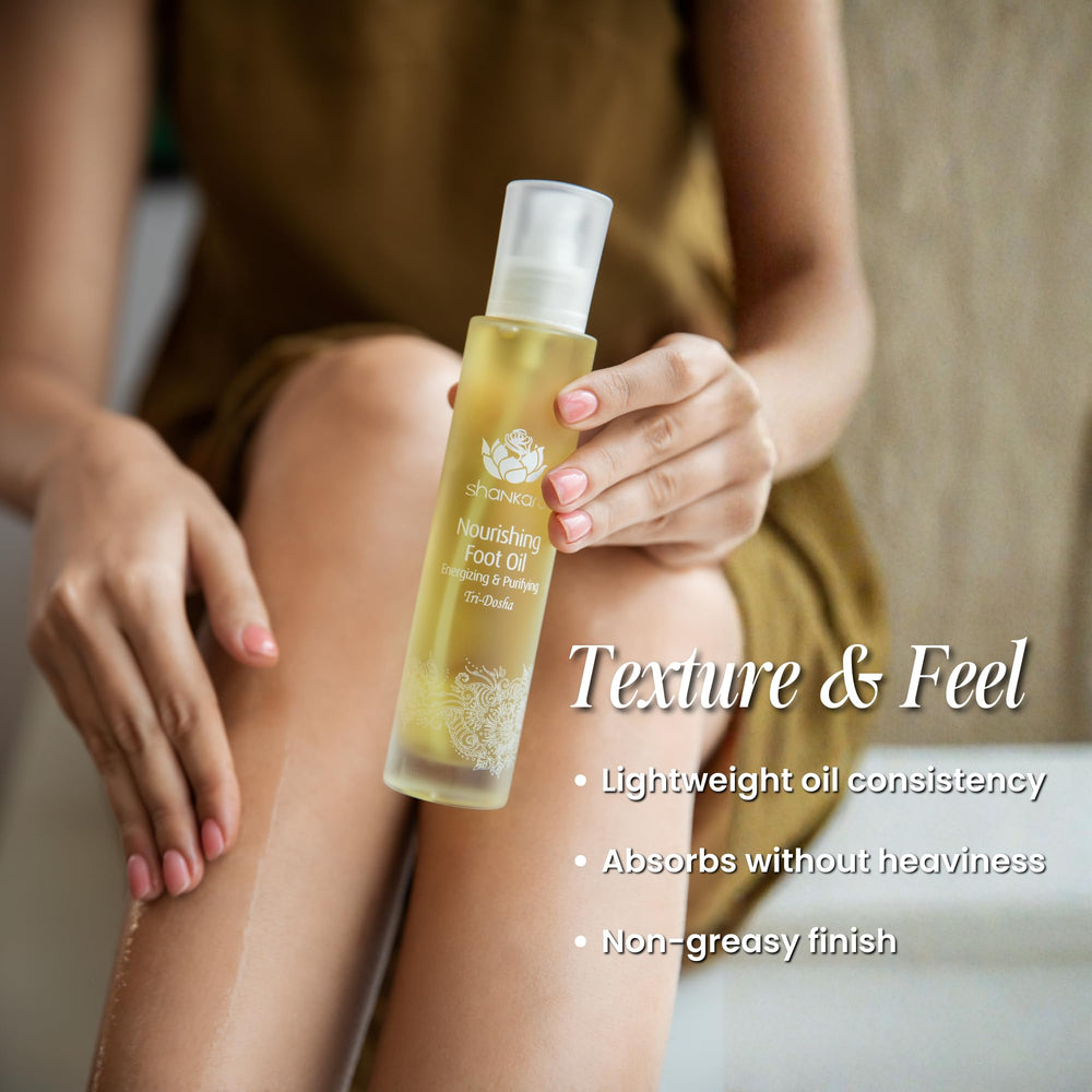 In-hand view of Shankara Foot Oil ready for massage.
