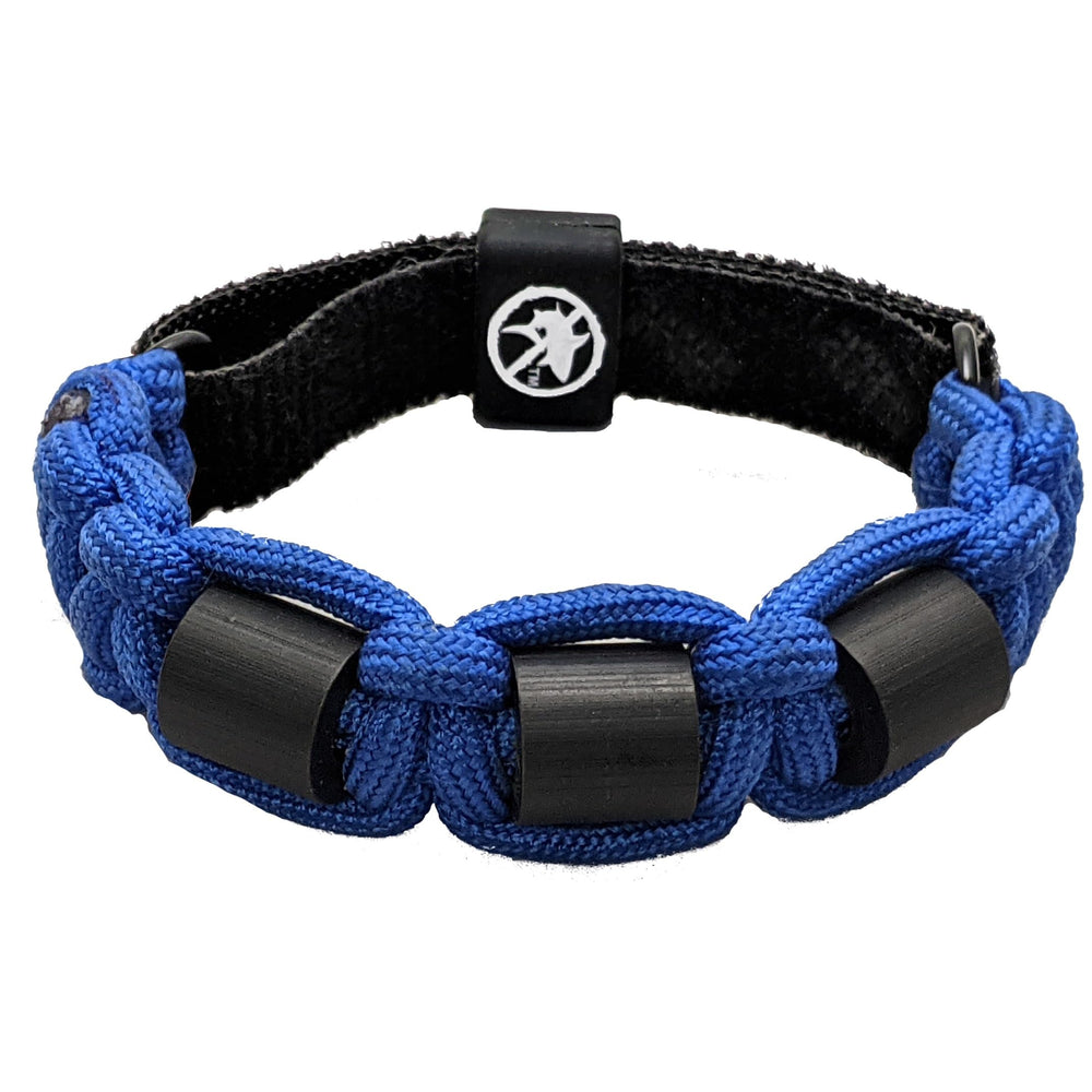 Shark OFF Rio style bracelet worn on the wrist during swimming for ocean safety.