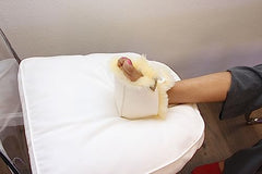 Sofsheep heel protector shows Velcro closures for a secure adjustable fit.