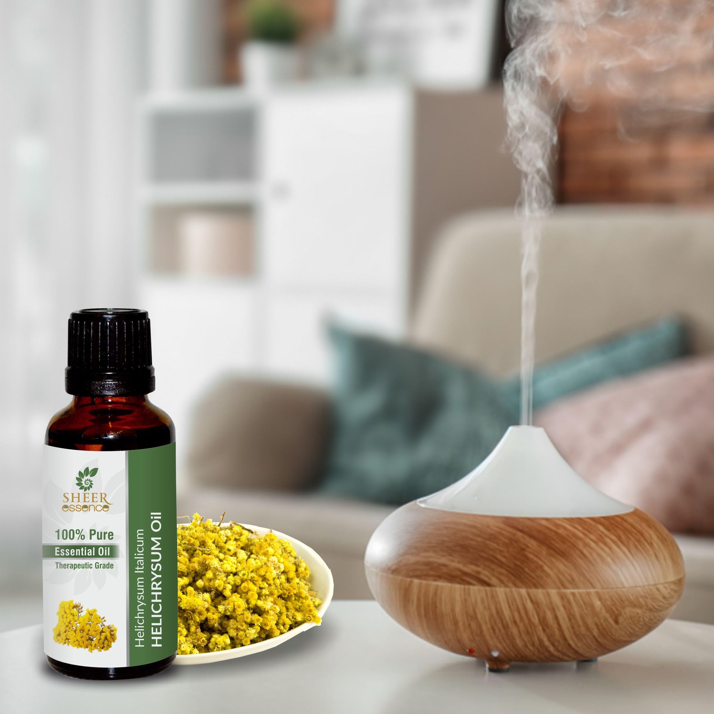 Close-up of Sheer Essence Helichrysum essential oil label detailing ingredients.