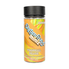 Shrumfuzed Miniz tropical peach gummies bottle; supports daily focus and natural energy.