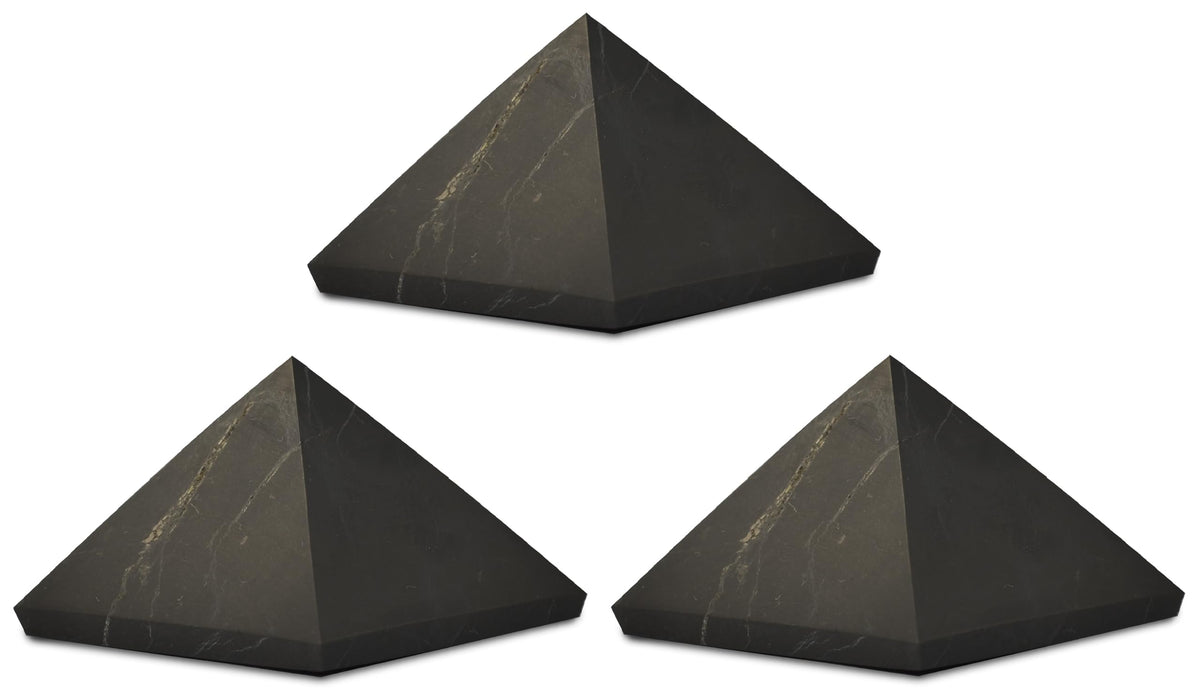 Shungite World 3 pcs pyramid close-up highlighting natural texture and energy balancing potential.