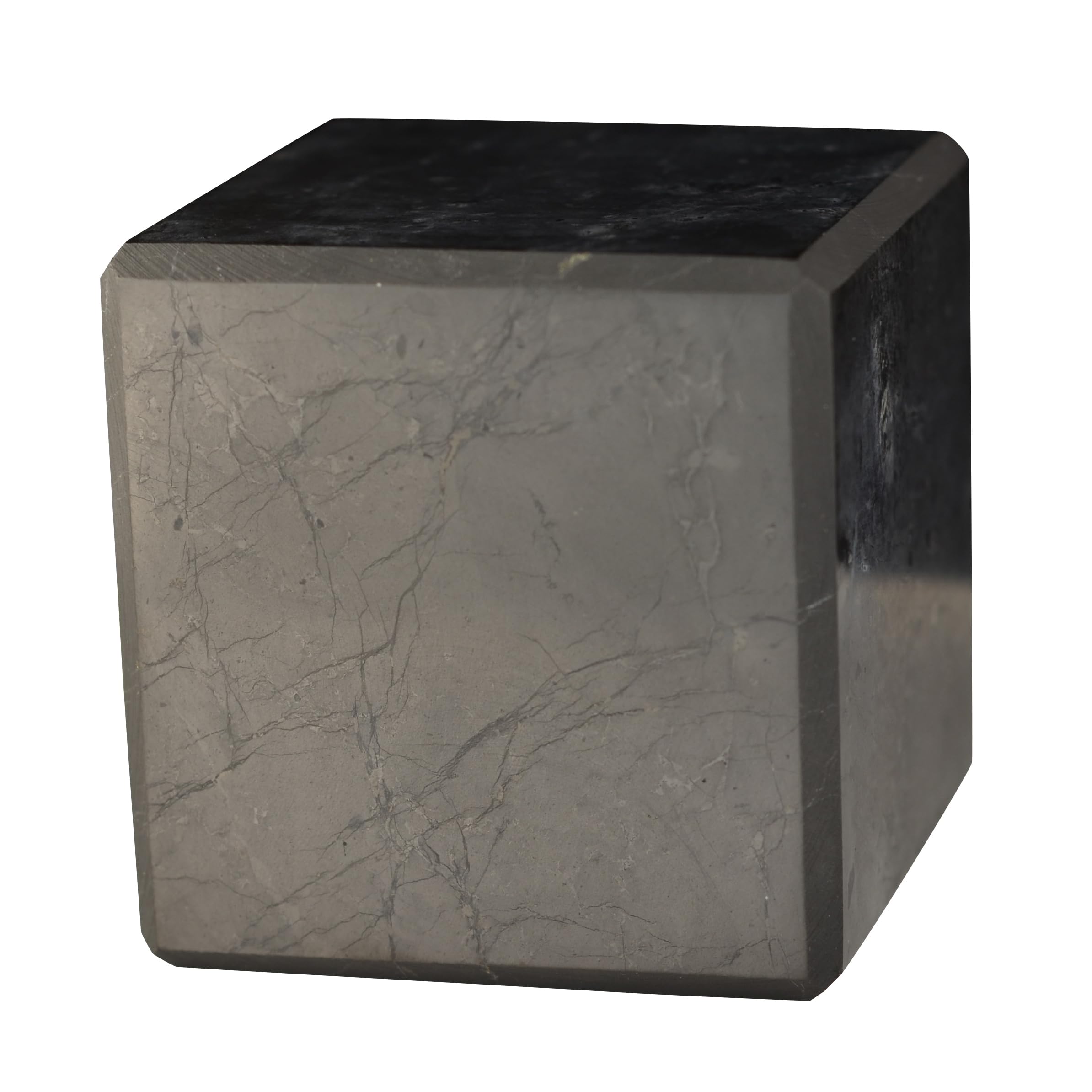 Shungite World authentic 60mm cube on desk for grounding and focus.
