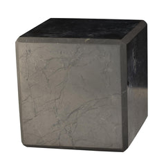 Shungite World authentic 60mm cube on desk for grounding and focus.