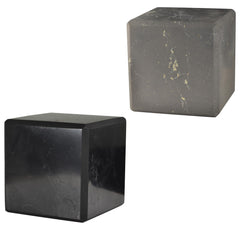 Shungite World polished cube 70mm on desk, grounding energy and protection.