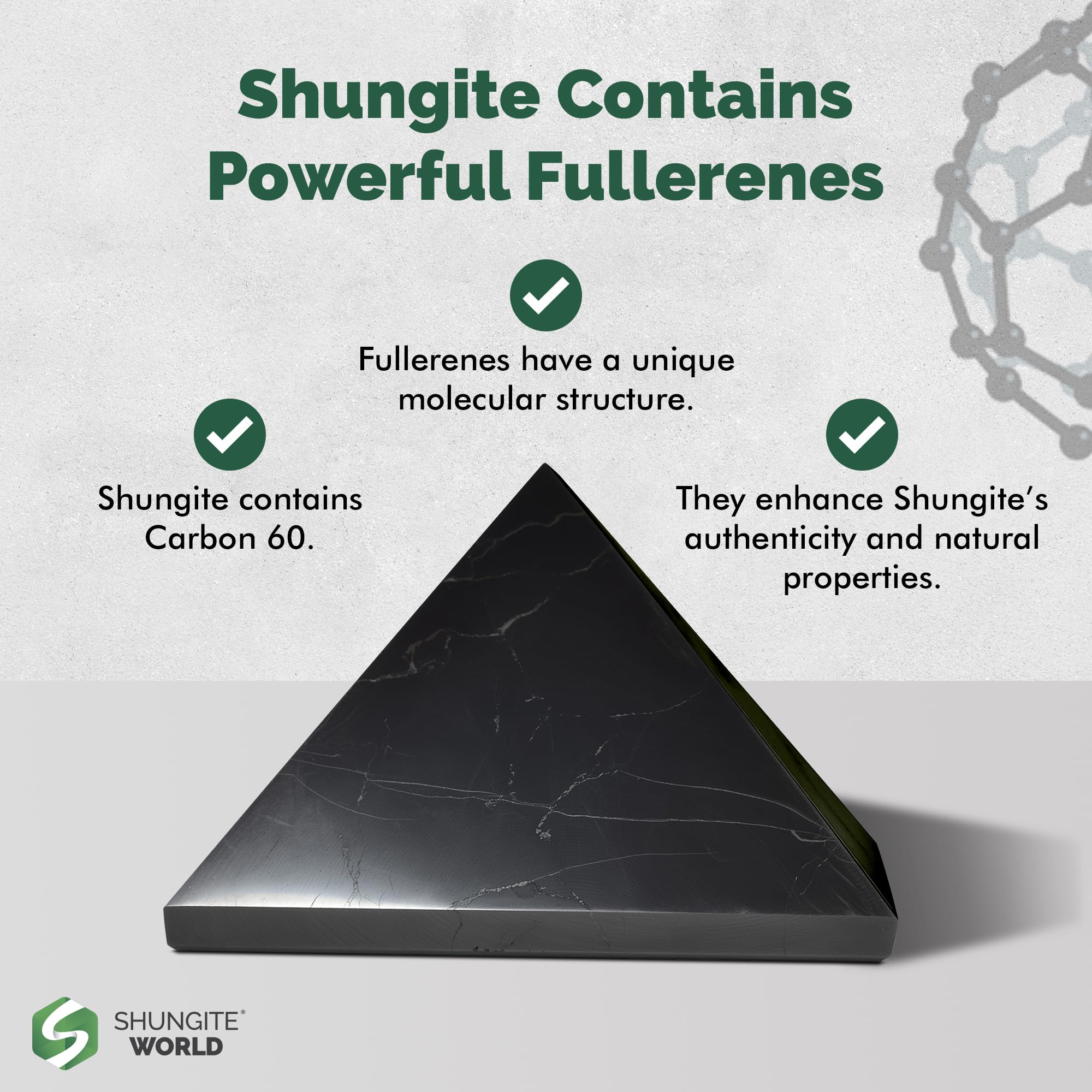 Shungite World pyramid contrasts dark stone textures for dramatic zen decor.