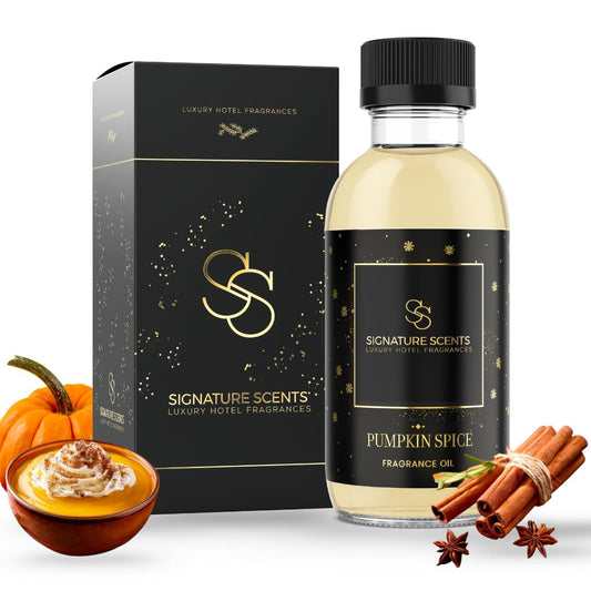 Signature Scents pumpkin spice diffuser oil bottle releasing warm autumn fragrance, ideal for hotel lobbies.