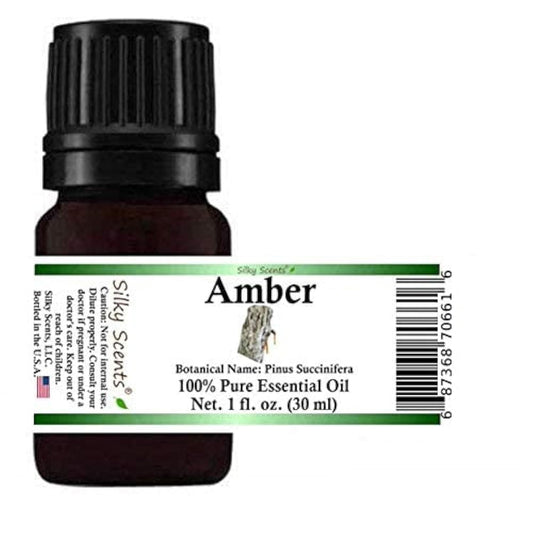 Silky Scents Amber Essential Oil bottle in amber glass, protecting aroma from light exposure.
