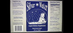 Pouring Wayne Rowland Silver Water into a glass for daily hydration