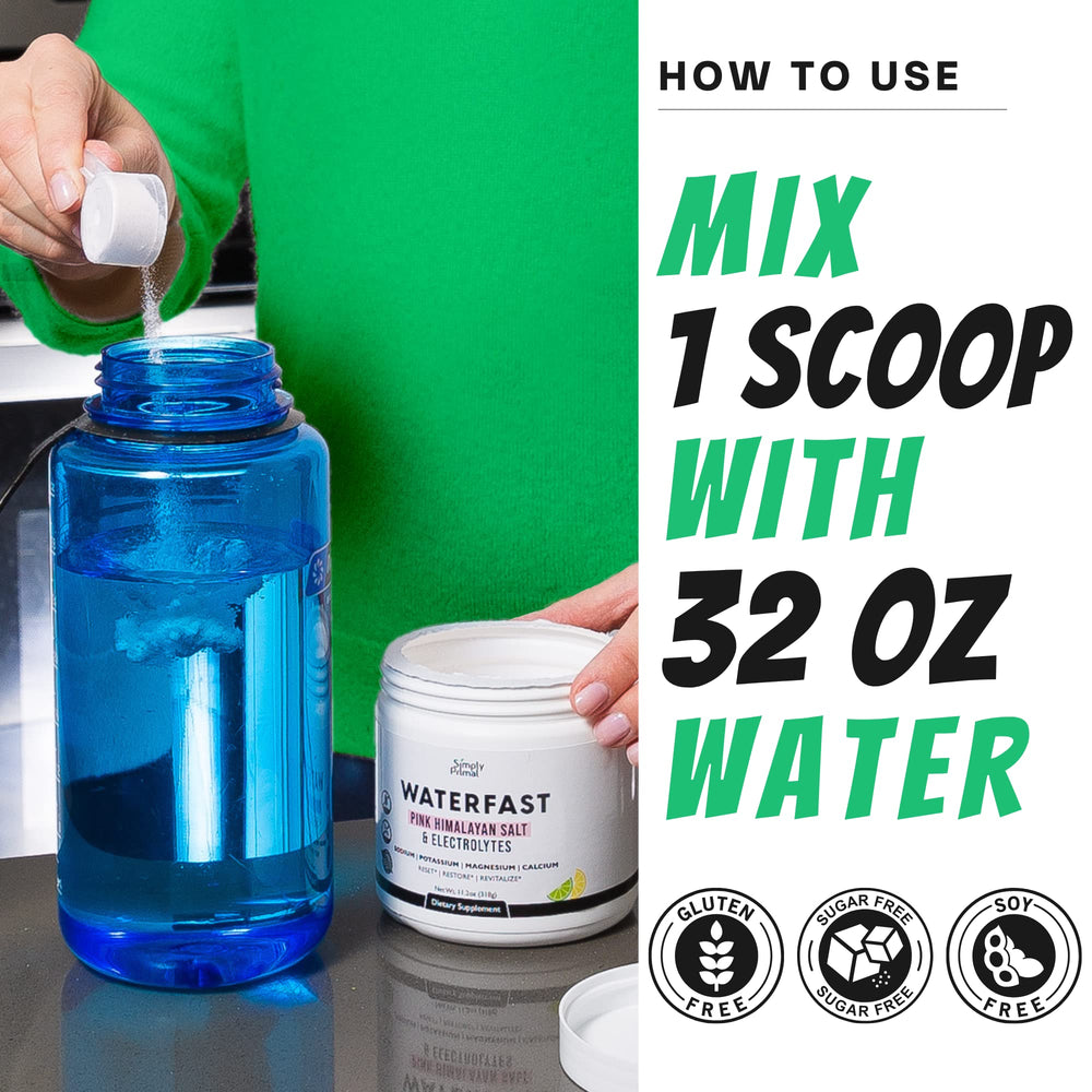 Glass with Simply Primal Waterfast lemon-lime drink for electrolyte intake