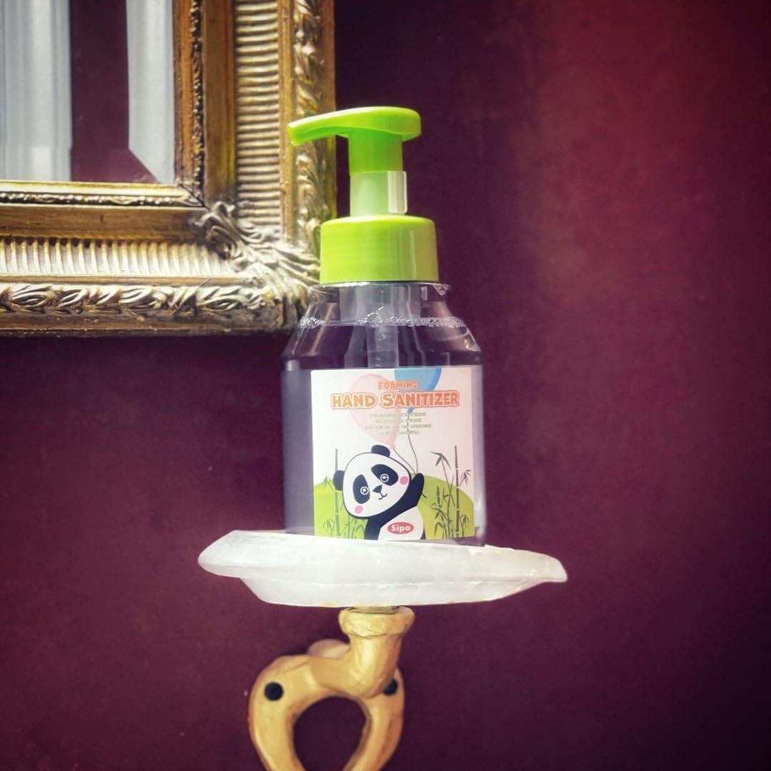 SIPA fragrance-free sanitizer being applied, suitable for sensitive skin.
