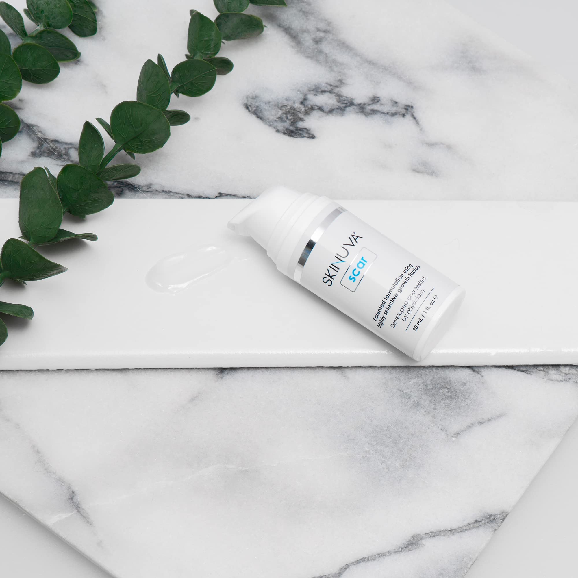 Skinuva silicone cream on scar suggests an occlusive, protective barrier.
