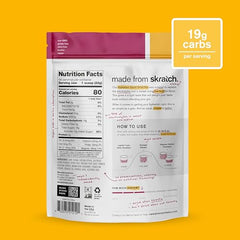 Skratch Labs hydration powder dissolves smoothly in a glass for easy mixing.