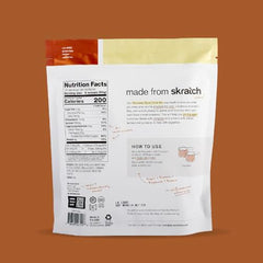 Skratch Labs Recovery powder scoop shows 8 g protein per serving