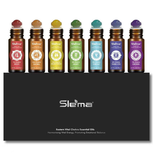 Slema 7 Chakra essential oil roller bottle closeup with crystal rollerball for precise application