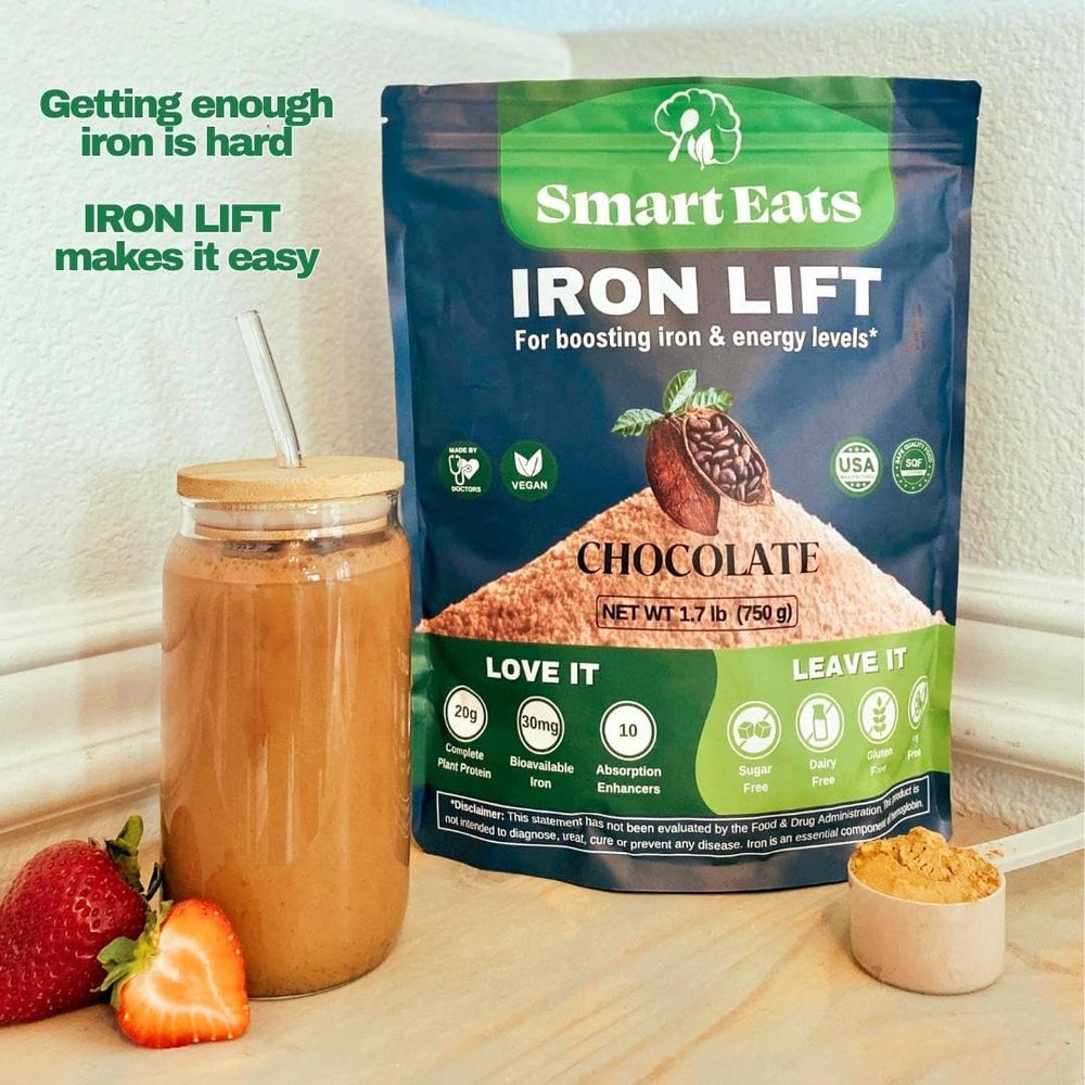 Chocolate flavored Smart Eats Iron Powder poured into a cup