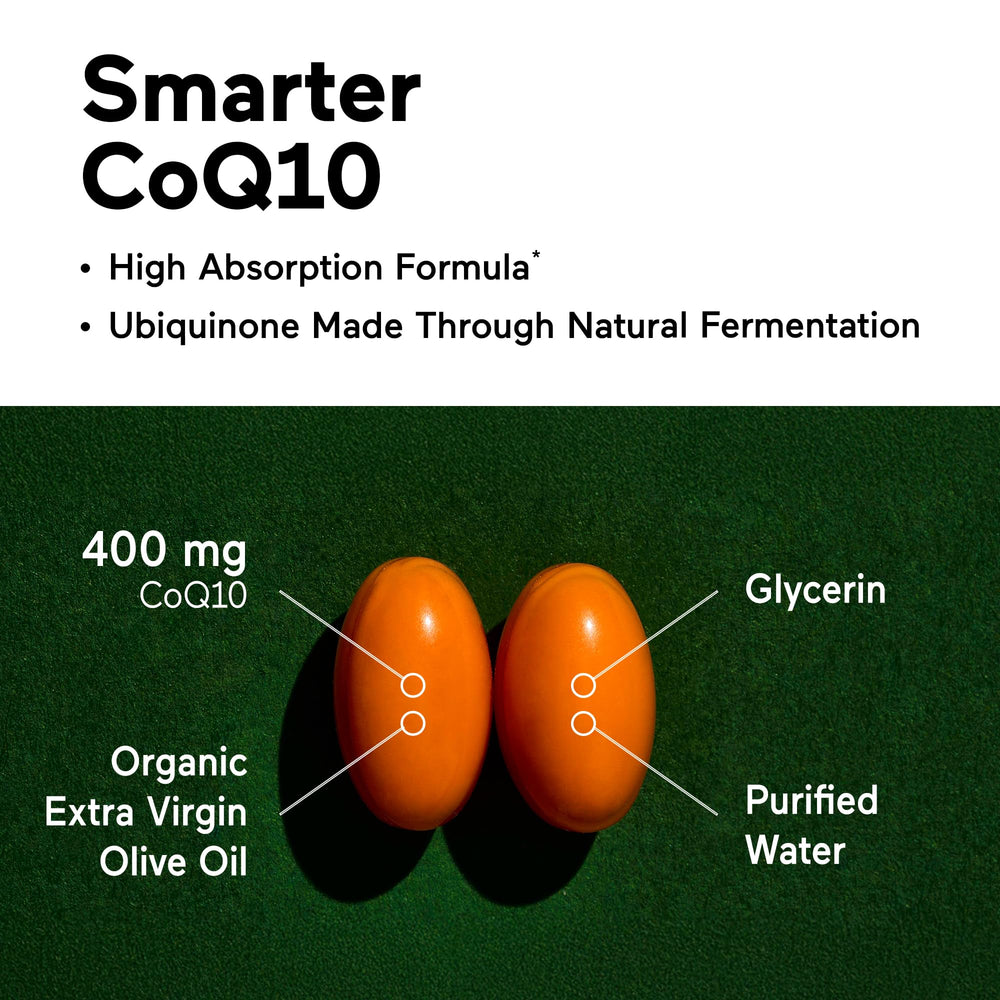 CoQ10 bottle beside organic olive oil on kitchen counter.