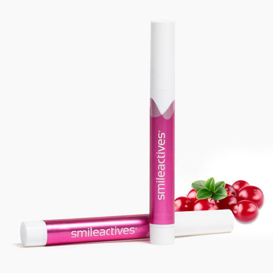 Smileactives stain remover pen shown for targeted whitening between teeth.