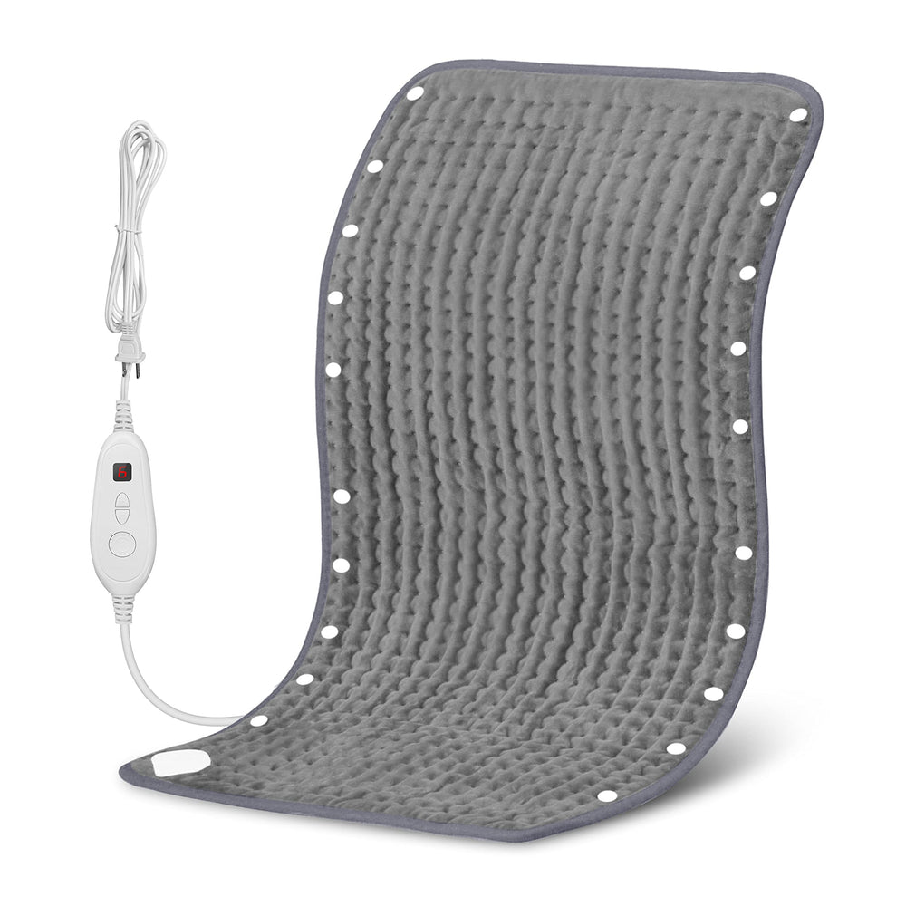 Snailax heating pad folded for foot warmer on bed, cozy comfort.