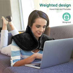 Snailax heat pad in office desk setup for hands-free relief.