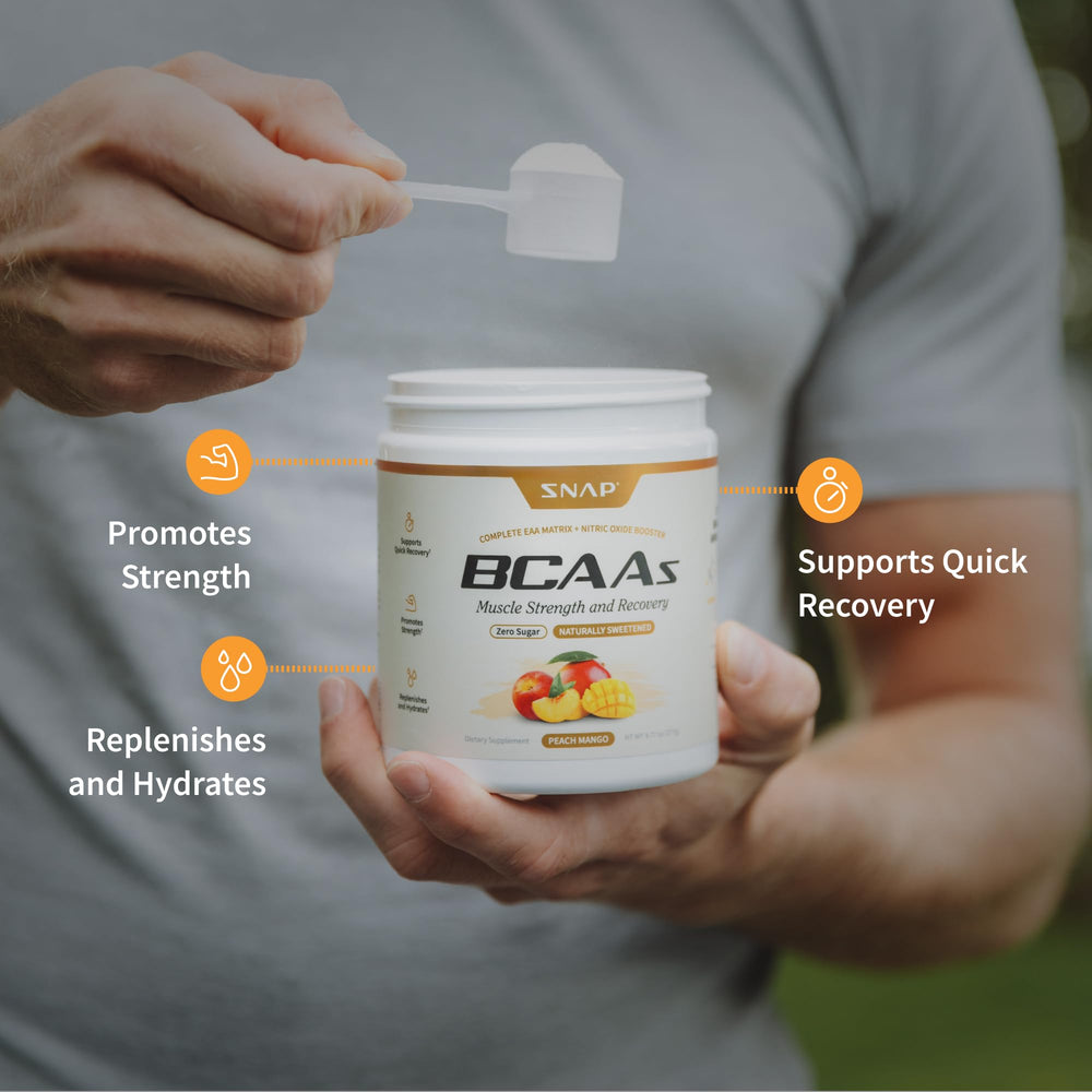 Snap Supplements BCAA powder in a glass of water for quick mix and flavor