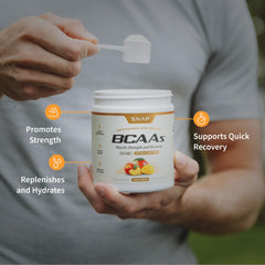 Snap Supplements BCAA powder in a glass of water for quick mix and flavor