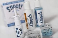 Snoot! blue nasal sprayer pair for quick, discreet use while traveling.