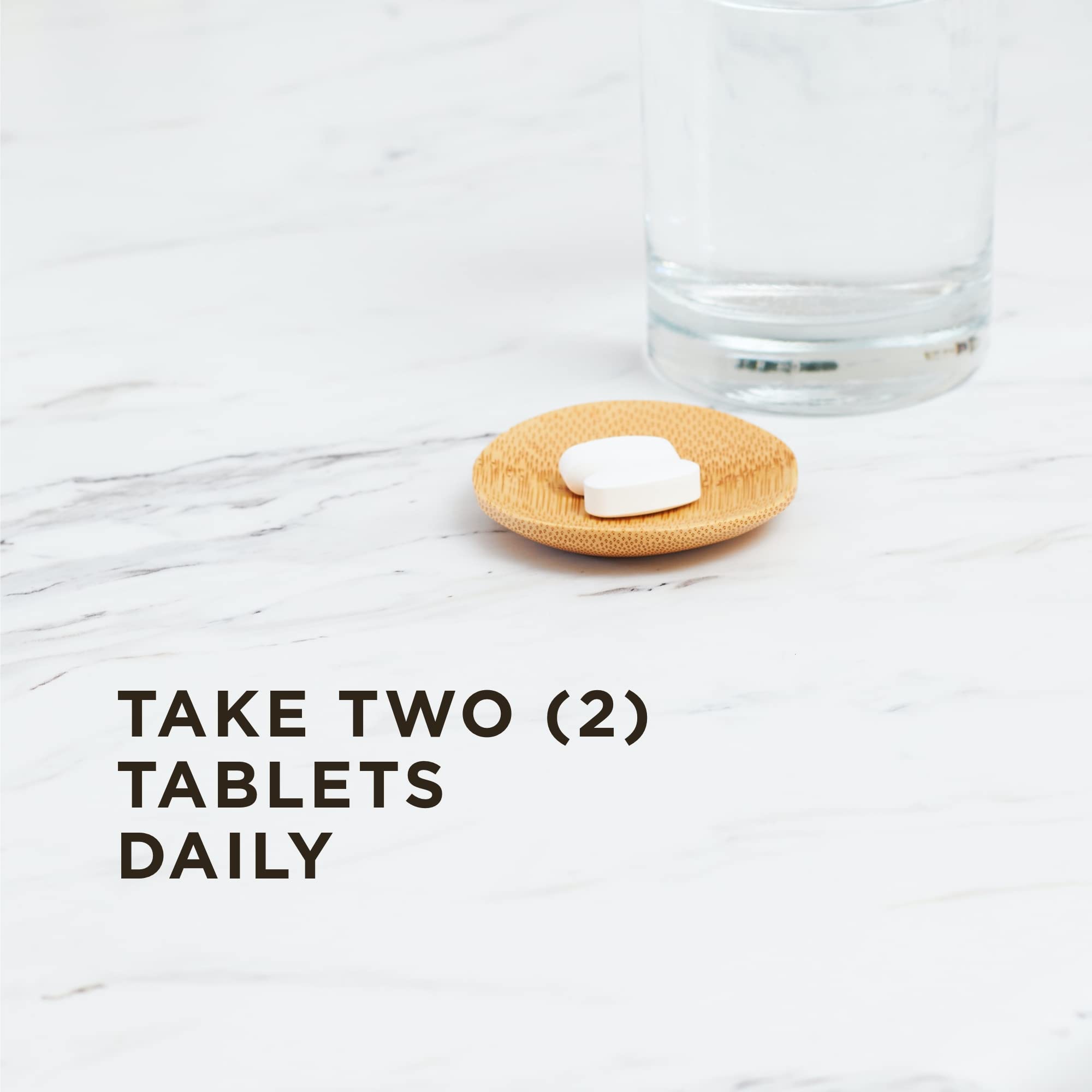 Close-up of Solgar Magnesium Citrate tablets showing compact size