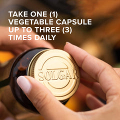 Solgar Milk Thistle bottle being poured for a simple daily routine.