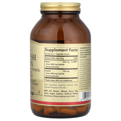 Solgar No-Flush Niacin bottle on a kitchen counter for daily supplementation.