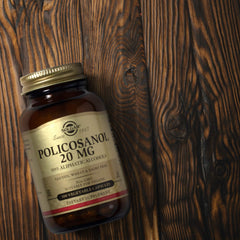 Solgar Policosanol 20 mg bottle with water, easy daily supplement.