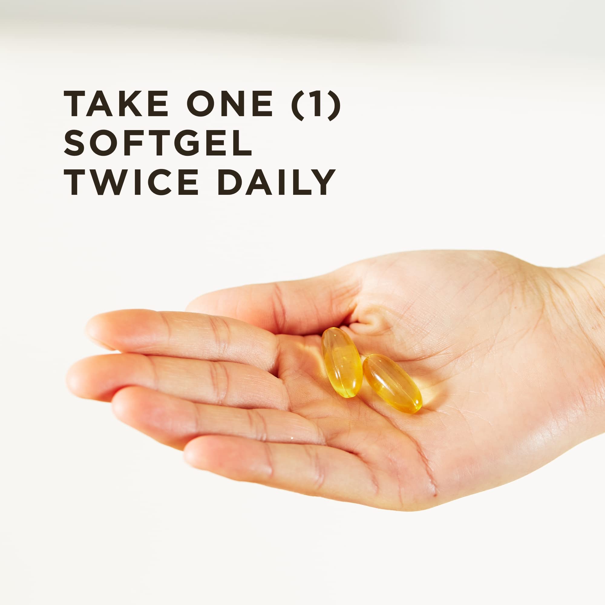 Solgar triple-strength omega-3 softgels close-up emphasizes easy-to-swallow capsules.