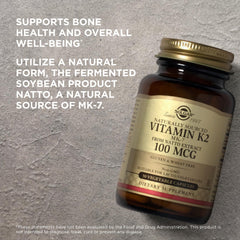 Solgar Vitamin K2 MK-7 bottle beside capsules ready for daily routine.