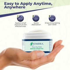 Athlete applying Sombra gel during workout warm-up.