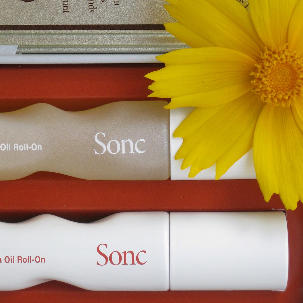Sonc OUT OF OFFICE hinoki pine roll-on for refreshing mental energy.