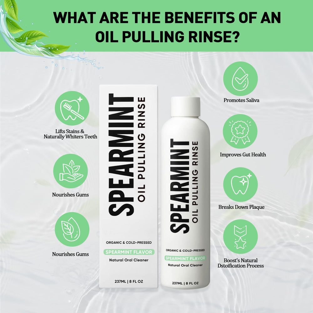 SUBMETIC Spearmint Oil Pulling Rinse splash with mint leaves for natural freshness.