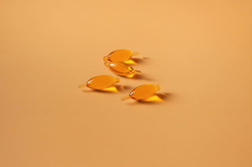Spoonful Salmon Squeeze softgel close-up highlighting omega-3