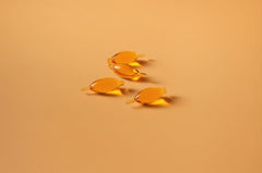 Spoonful Salmon Squeeze softgel close-up highlighting omega-3