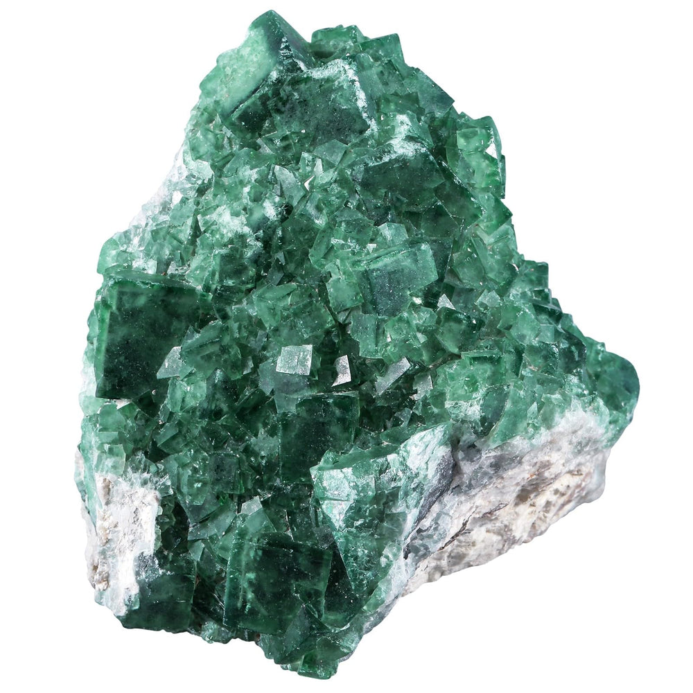 Sportmusies green fluorite cluster on desk adds natural decor and focus ambiance.