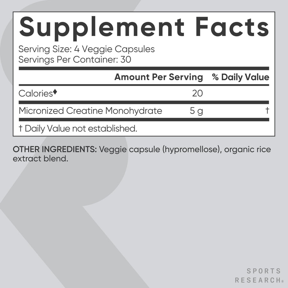 Sports Research Creatine Monohydrate Capsules in hand, supports strength and recovery when paired with workouts.
