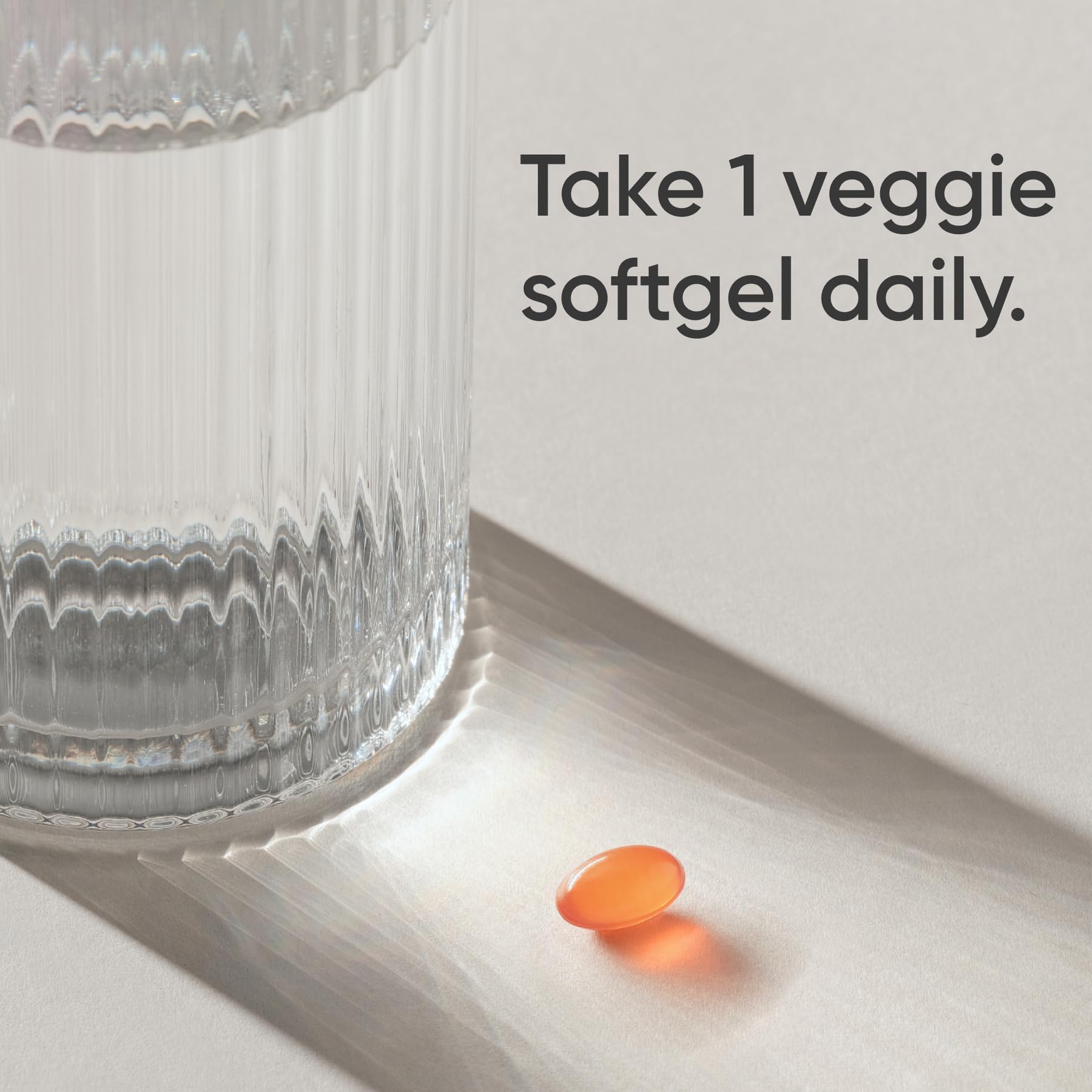 Sports Research vegan D3 from lichen with MCT oil label highlights enhanced absorption benefits.