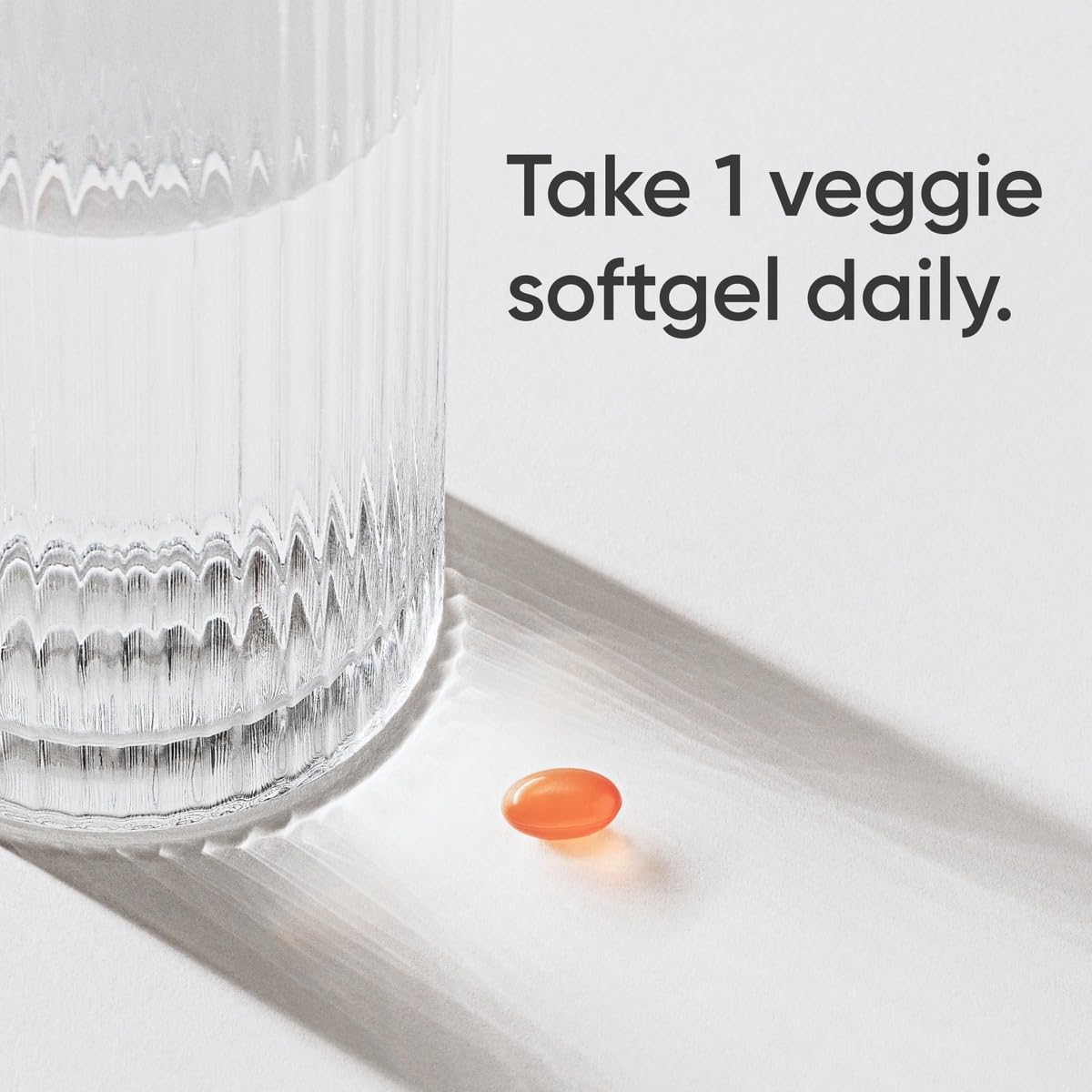 Sports Research Vitamin K2 MK-7 bottle with coconut oil aiding absorption.