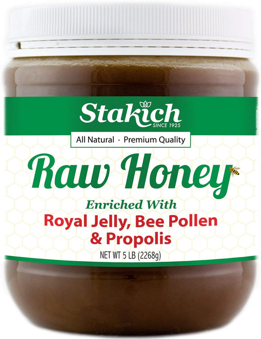 Stakich Royal Jelly enriched raw honey bottle pour shows natural energy and rich flavor.