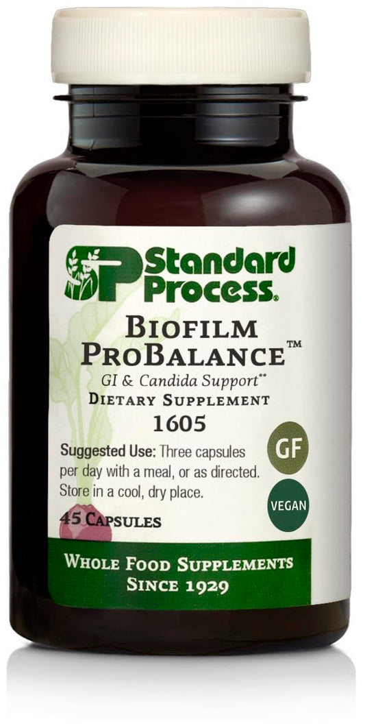 Standard Process Biofilm ProBalance bottle pour demonstrates easy daily probiotic use for gut support.